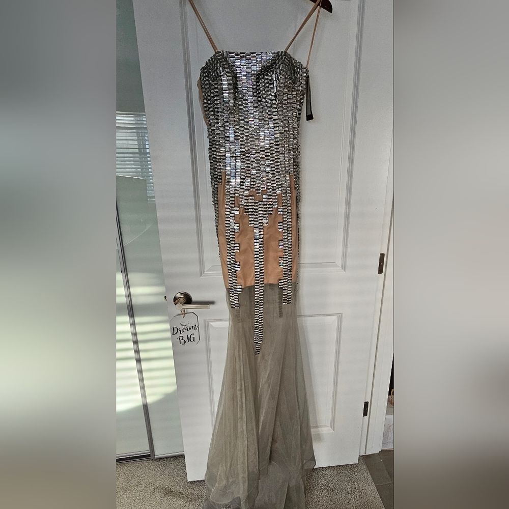 Zircon couture dress new with tags Size 4